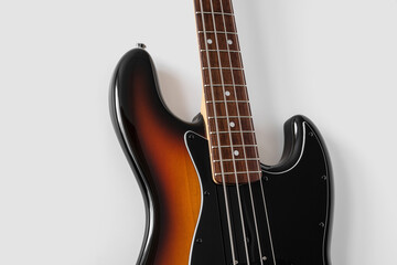Fototapeta na wymiar Black bass guitar on white background. Music instrument