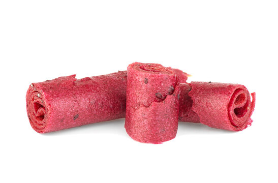 Natural and healthy snack food - fruit pastille from apples, raspberry and currant on a white background. Fruit Marshmallow.