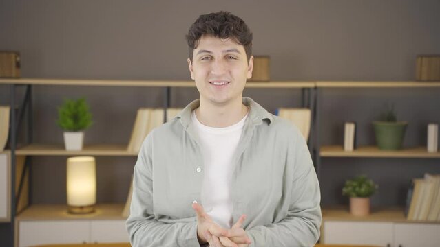 Portrait of excited positive young man.