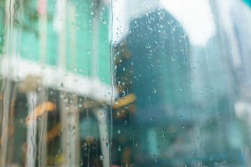 rain on window in the city