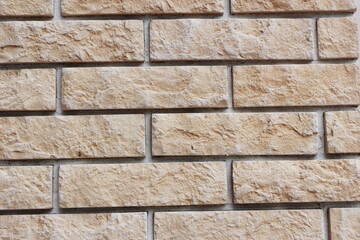 Photo texture yellow brick and white seams.