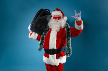 Santa claus with music box in hand