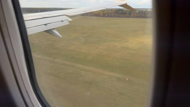 View from airplane landing in Modlin Airport, Poland in November