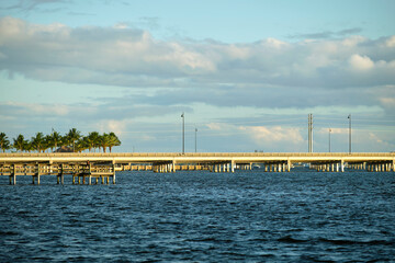 Barron Collier Bridge and Gilchrist Bridge in Florida with moving traffic. Transportation...