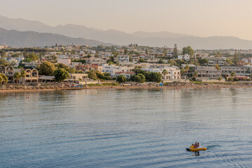 Cityscape at sunset, Agioi Apostoli, Chania, Crete, Greece.