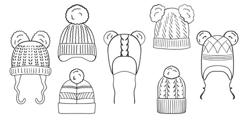 Set of hand drawn children's winter hats. Doodle vector illustration isolated in white background