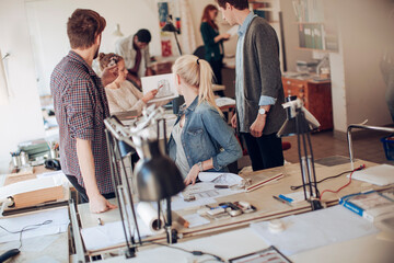 Obraz premium Diverse architects working on construction plans in their office
