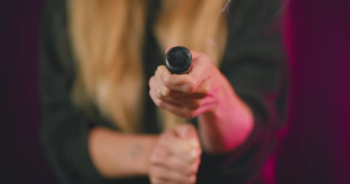 Firing a party popper streamer close up
