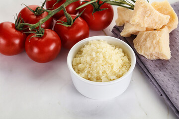 Shredded Italian hard parmesan cheese