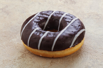 Glazed sweet tasty chocolate donut