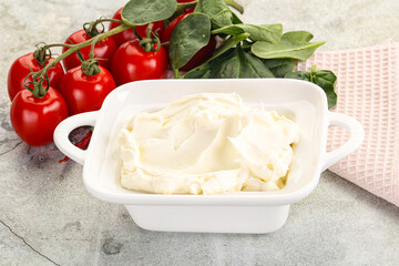 Soft cream cheese in the bowl