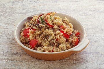 Arabic cous cous with meat and tomato