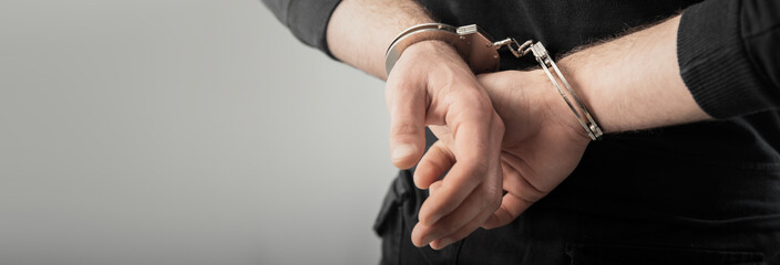 man hand handcuffs