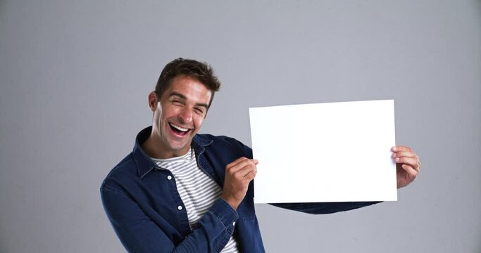 Excited, man and paper poster for advertising, marketing and commercial promotion. Portrait, empty banner sign and mockup space presentation, information flyer and announcement on a grey background