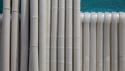 texture of a wall of plastic pipes