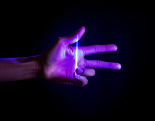 Fototapeta na wymiar Hand is sparking in purple electrical technology. Black background. AI generated.