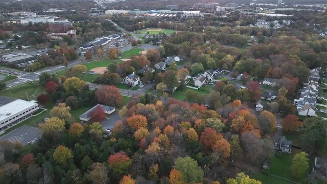 Drone footage of the houses near to Prince Rodgers Park in Bridgewater town at sunset in New Jersey