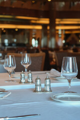 Art Deco interior design style furniture, carpets and paneling onboard classic ocean liner cruiseship cruise ship main dining room restaurant