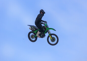 Moto freestyle jump rider on motorcycle - 680284618