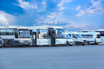 Buses in a parking lot at sunrise - 680284692