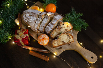 Christmas traditional fruit bread stollen. Traditional Christmas festive pastry dessert. Stollen for Christmas