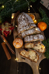 Christmas traditional fruit bread stollen. Traditional Christmas festive pastry dessert. Stollen for Christmas