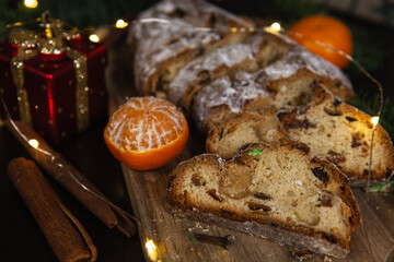 Christmas traditional fruit bread stollen. Traditional Christmas festive pastry dessert. Stollen for Christmas