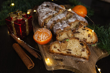 Christmas traditional fruit bread stollen. Traditional Christmas festive pastry dessert. Stollen for Christmas