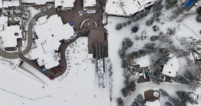 Aerial top down view of Vail, winter ski resort in Colorado. Charming snow covered town with narrow streets