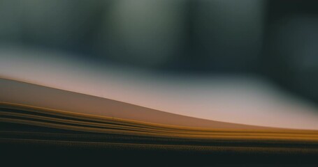 Turning the pages of a book, close up