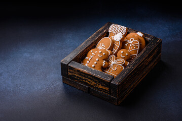Beautiful festive Christmas composition of tangerines, gingerbread and star anise