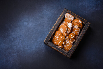 Beautiful festive Christmas composition of tangerines, gingerbread and star anise