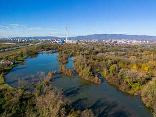 Hidden lakes on the eastern part of Zagreb city, Croatia, created by the Sava river tributaries, now used for fishing and walking in nature photographed with drone
