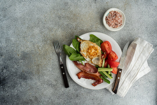 From above of healthy Breakfast Plate with Egg and Bacon