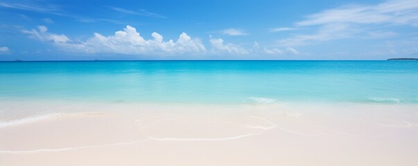 Capture the silky smoothness of a white sand beach under a clear blue sky. - obrazy, fototapety, plakaty