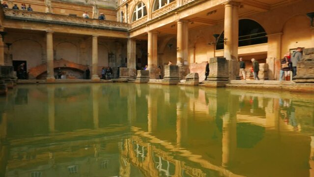 A low angle shot of the famous spa thermal complex in the city of Bath, England, UK. The temple was established in 60-70 AD and the bathing complex was gradually built up over the following 300 years
