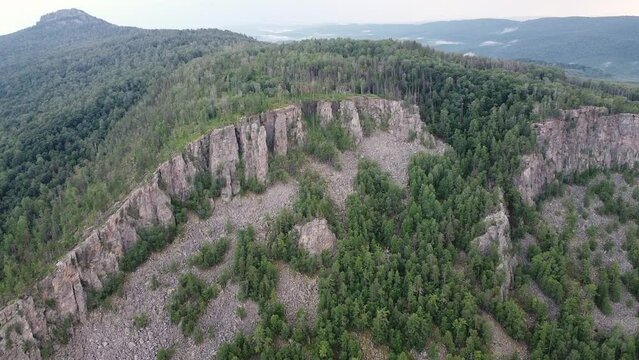 Aerial view of rocks in the middle of the forest