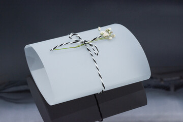 support with flower for wedding invitation