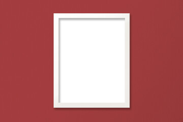 Poster Mockup with White Frame on Red Textured Wall