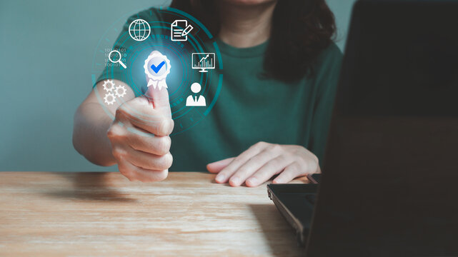 Quality Assurance Service Guarantee Standard Internet Business Technology Concept. Business people hand show signs of top high quality assurance, Guarantee, Standards, ISO certification concept.