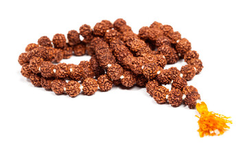 Buddhist or Hinduist Japa mala (prayer beads) made of rudraksha isolated - 680316642