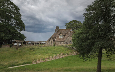 Traditional Yorkshire stone cottage at the top of a slope