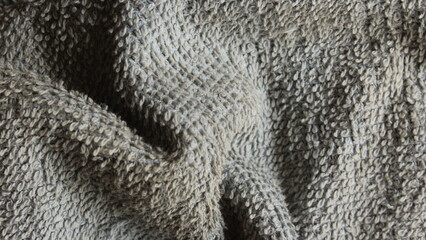 Abstract Background of Textured Waves of Dirty Blue Towel