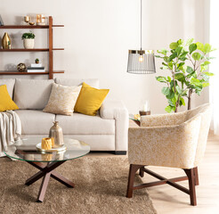 Spring-Themed Living Area, Neutral-Toned Sofa with Mustard Accent Pillows, Complemented by a Textured Armchair, Round Glass Coffee Table, and a Lush Fiddle Leaf Fig, Illuminated by a Pendant Light.