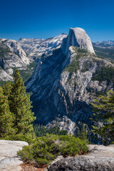 View of Half Dome on a sunny day taken from Glacier Point, Yosemite National Park.