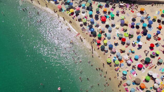 Enchanting coastal beauty captured in a video of Tropea, Italy &ndash; showcasing its stunning turquoise waters, rugged cliffs, and charming town, a Mediterranean paradise