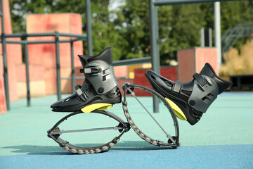 Stylish kangoo jumping boots in workout park