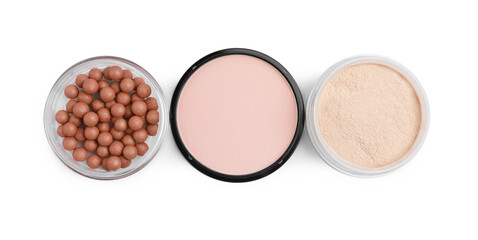 Different face powders isolated on white, top view