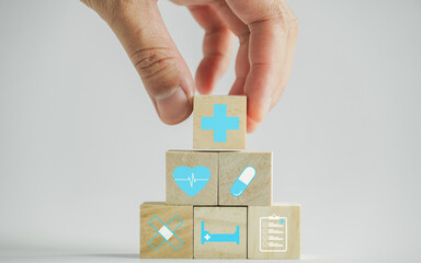 Health concept and medical concept Health icons on wooden blocks, health care trend.