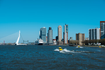 A magnificent view of Rotterdam waterfront on a beautiful, sunny day, featuring the renowned bridge...